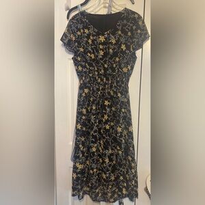Women’s Black dress with yellow flowers size Large